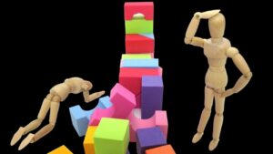 building blocks with wooden 'builders'